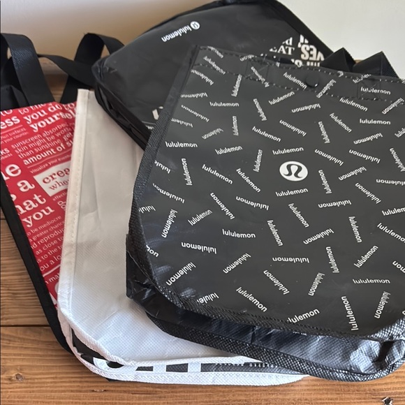 Lululemon bags (red, white, 2 black) - Picture 1 of 3